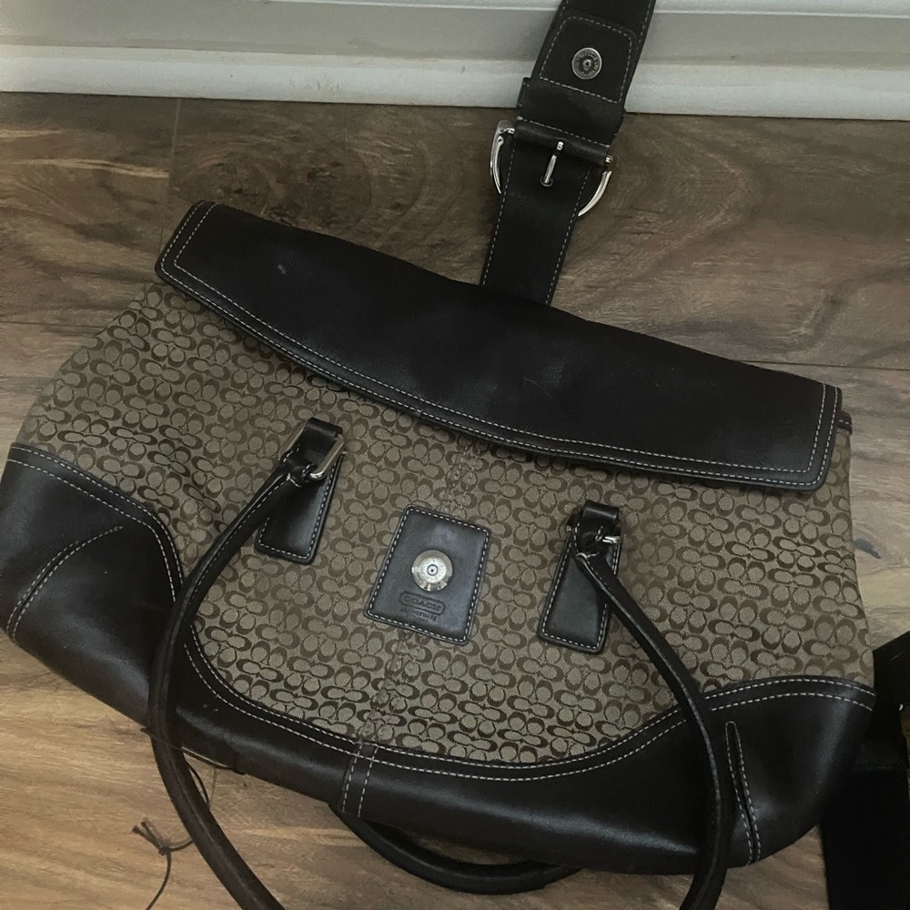 I am selling a coach bag that is used with wear and tear